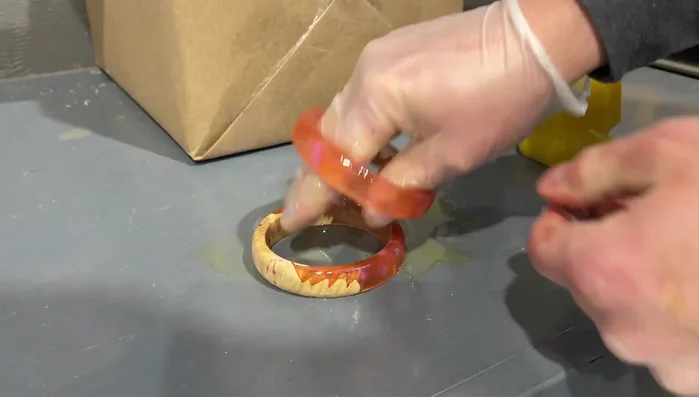 Polish the bracelets with Tonal Bolts Wood Hoodie for a polished matte finish.