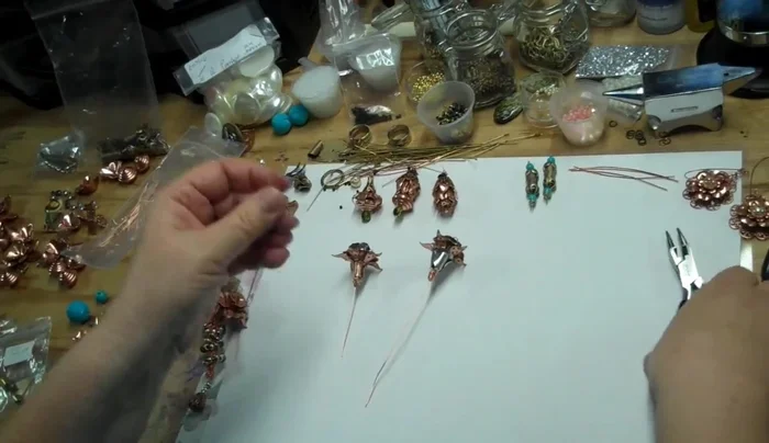 Assemble the flower: Attach flower components (cups, petals, etc.) to the squiggly wire.