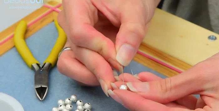 Add 3 seed beads to the end.