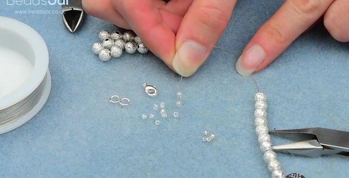 Add 3 seed beads to the end.