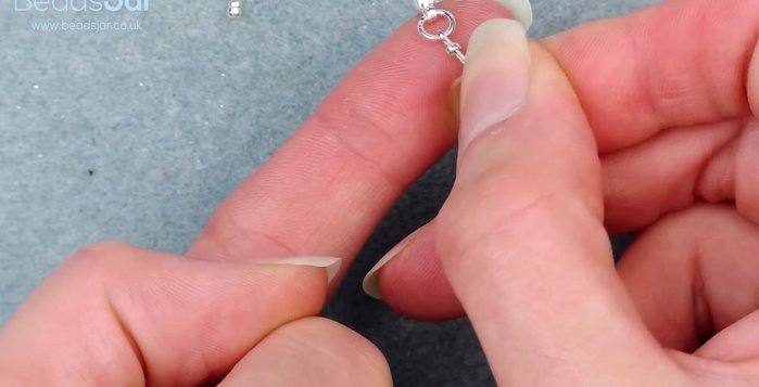 Tuck the excess wire into the beads.