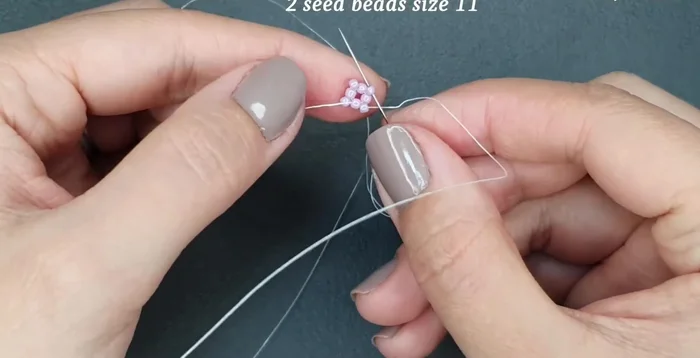 Add the third row: Insert two size 11 seed beads, passing through the next seed bead from the previous row. Repeat across the row.