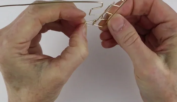 Separate and refine: Separate the wires and adjust the bends to ensure symmetry and evenness.