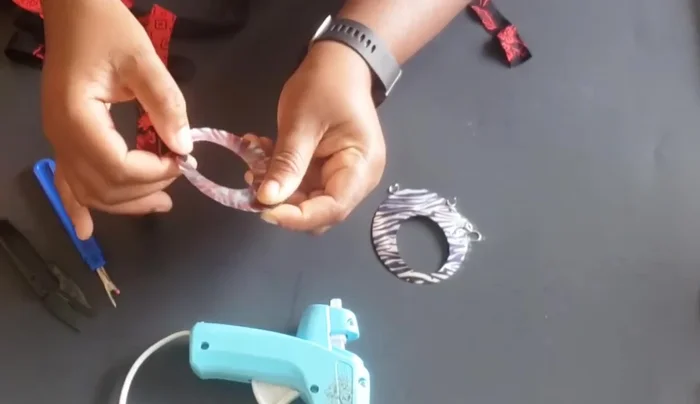 When nearing the end, fold in both the front and back edges of the fabric.