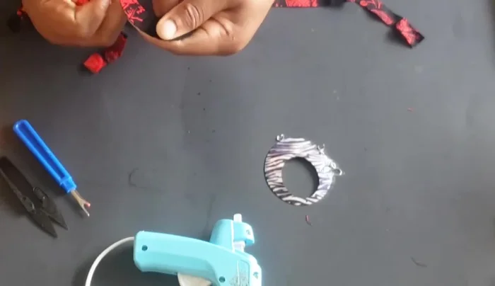 When nearing the end, fold in both the front and back edges of the fabric.