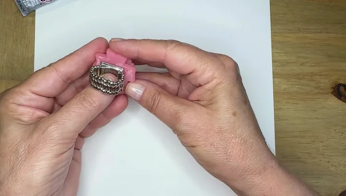 Gently press down the cabochon for a few seconds to secure it.