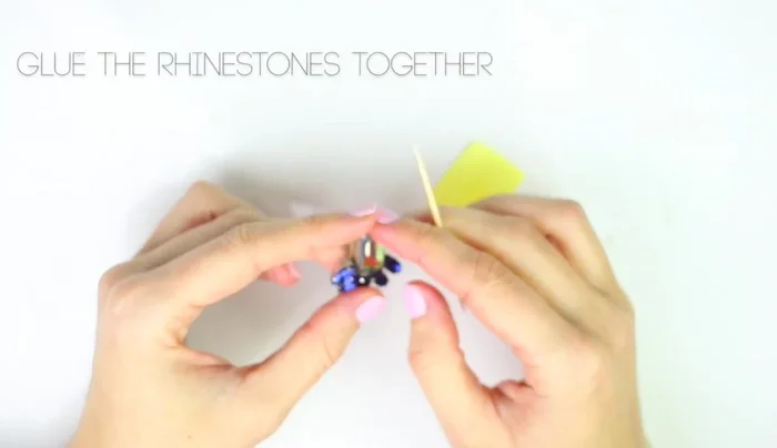 Glue all the rhinestones together using a toothpick, being careful not to apply glue everywhere.