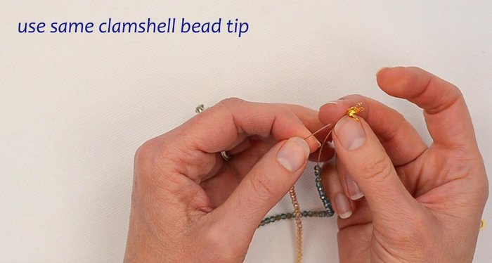 Repeat step 5 for the other ends of the crystal strands, using the same clamshell tip for both.