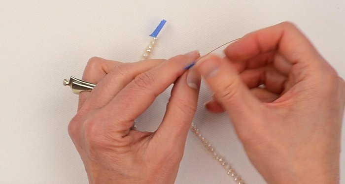 Finish the pearl strand ends using the same technique as in step 5.