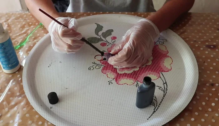 Apply liquid latex to areas of the crystal you don't want copper to form on.