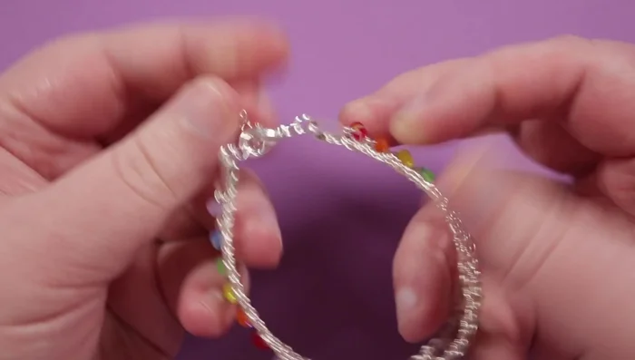 Gently shape the bracelet to fit comfortably around the wrist.