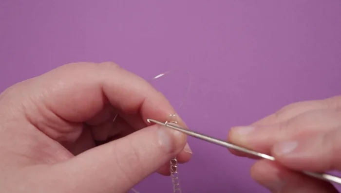 Connect the last loop of the long row to the first loop of the new row using a loop.