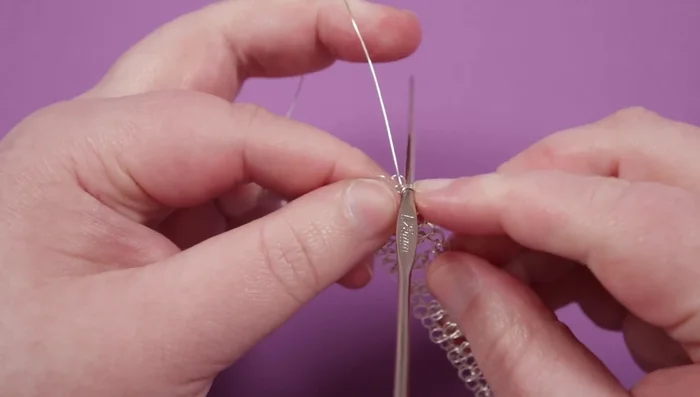 Once the desired number of rows is complete, reinforce the frame by crocheting around the edges once more.