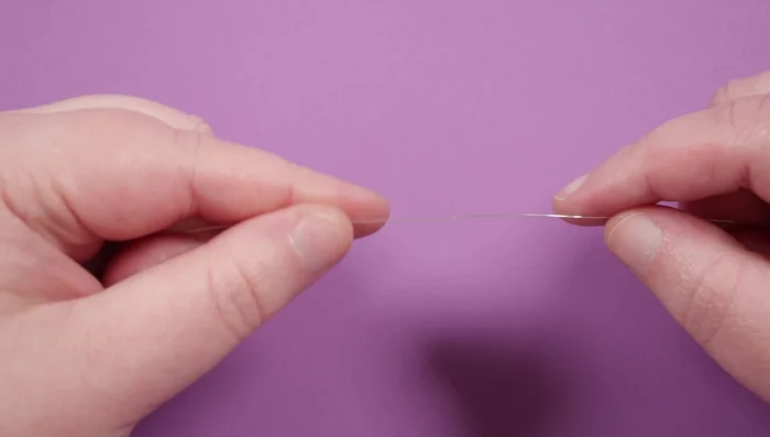 Prepare the wire by leaving a short tail attached to the reel.