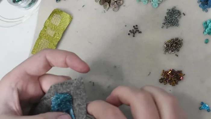 Add rows of beads to create spotted accents, using couching to secure.