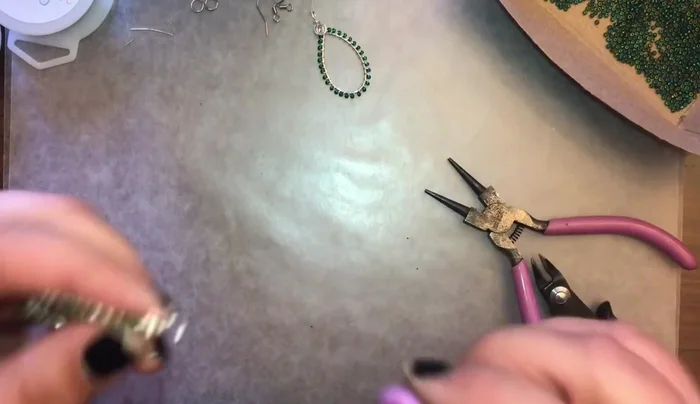 Tuck in the extra wire at the end of the spiral. Use pliers to secure it. Smooth out any pointy bits.