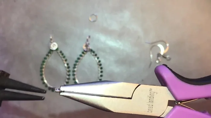 Open jump rings carefully by twisting, not pulling apart. Attach the earring to the jump ring, then attach the jump ring to the ear wire.