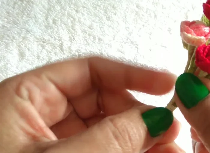 Place, stick, roll. Put U, stick fat, cut, put small U, stick.