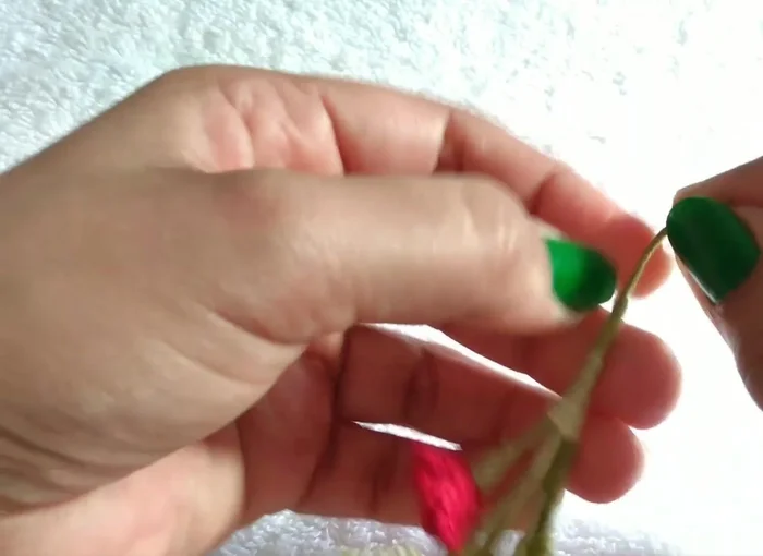 Place, stick, roll. Put U, stick fat, cut, put small U, stick.