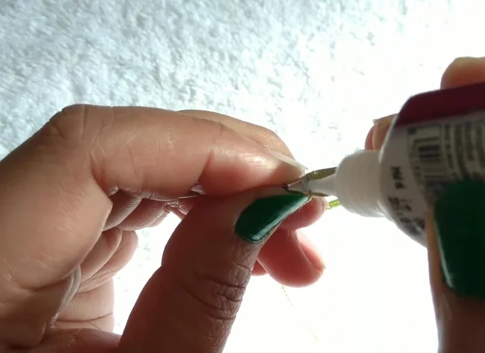 Stick, turn A inside, stick, cut U, place on top, stick on back.