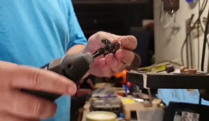 Polish the inside of the rings using a Dremel and abrasive cloth.