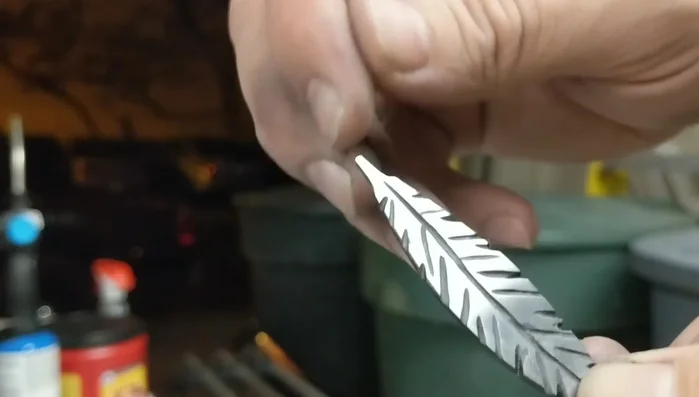 Drilling a hole for the necklace bail.