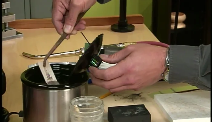 Clean the metal in a pickle (mild acid solution) to remove flux and oxidation.