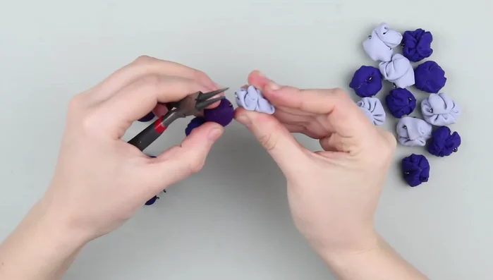 Thread the string through small plastic beads, securing each with knots.