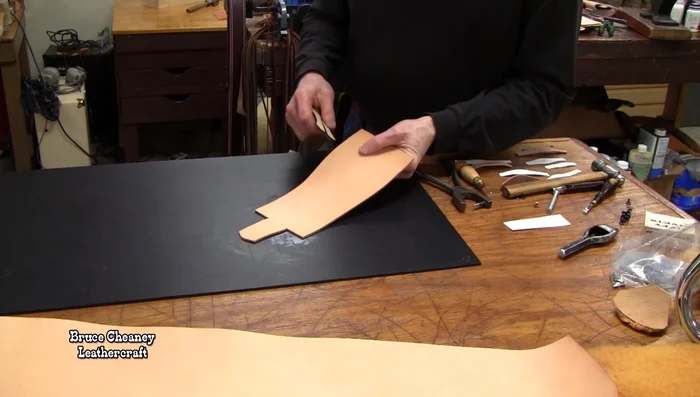 Prepare Leather and Pattern: Choose a firm piece of vegetable-tanned leather (6 oz suggested). Trace your ring pattern onto the leather. (Close up of patterns shown at 62.64).