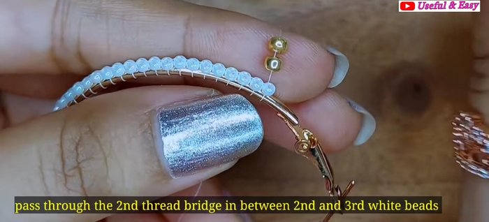 Red Hoop Earring (Circular Brick Stitch): Secure the end with knots and trim the thread.