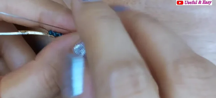 Green Ombre Hoop Earring (Herringbone Stitch): Add the fourth line with golden and parrot green beads using herringbone stitch.