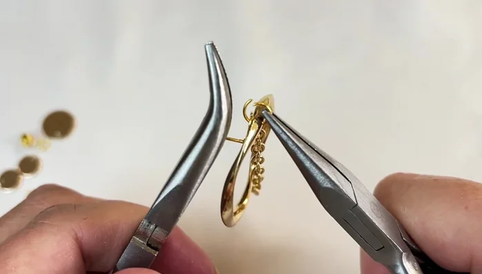 Close the jump ring securely, ensuring no gaps.