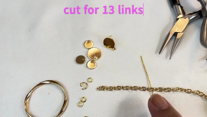 Measure and cut the chain. Need 13 links.