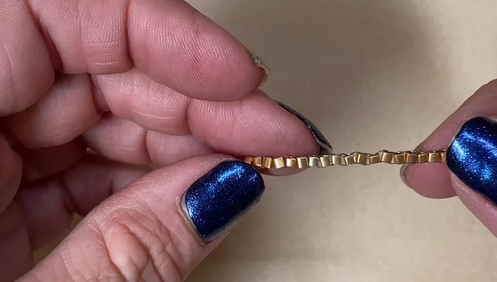 After completing the ladder stitch, go back and even out the beads by passing the needle up and down through each bead to straighten the row.