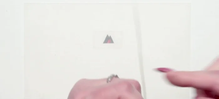 Create the rows: Starting from one tail, wrap the wire around the bead, under the last wrap and about a quarter inch distance. Continue this pattern with the other tail, alternating above and below.