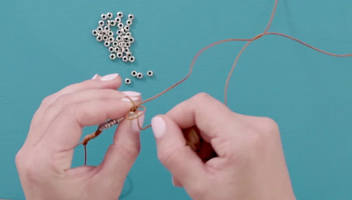 Continue braiding: Repeat step 3 until you have another 3 inches of braid.