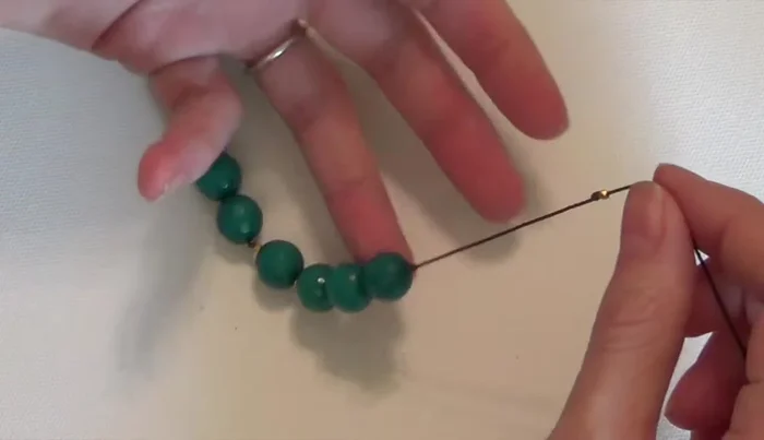 Add the final spacer bead and tie a knot.