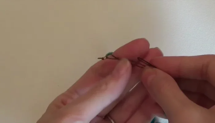Trim the excess cord from the sliding knot.
