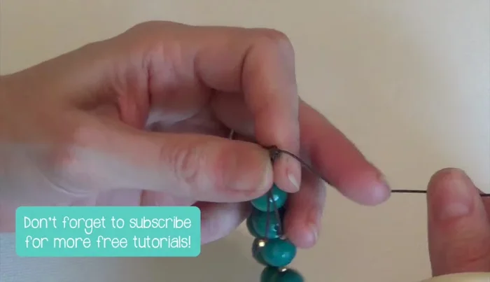 Trim the excess cord from the sliding knot.