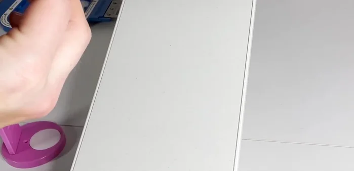 Attach the bar pin to the back using glue or sewing.