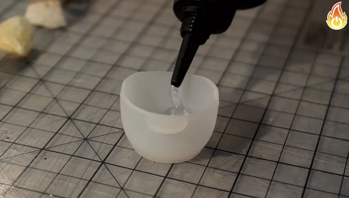 Fill any small holes in the ring with leftover resin.