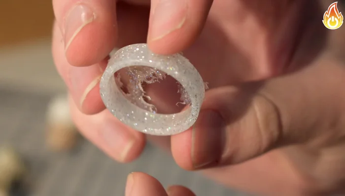 Fill any small holes in the ring with leftover resin.