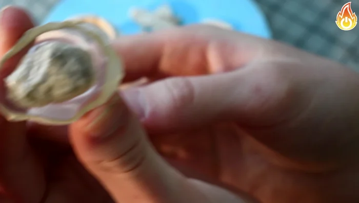 Glue the ring band to the rock using a small amount of UV resin and cure it under a UV light.