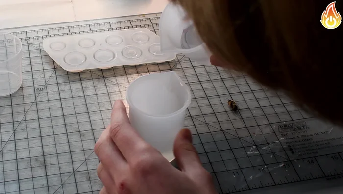 Apply a two-part epoxy resin to the rock, using a heat gun to remove any trapped bubbles.