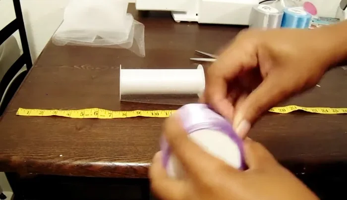 Measure and cut ribbon: Cut one yard of each ribbon color you've chosen. Repeat for the second anklet.