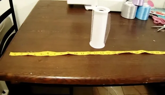 Measure and cut ribbon: Cut one yard of each ribbon color you've chosen. Repeat for the second anklet.