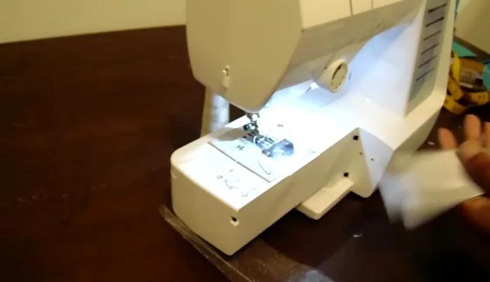 Sew on the ribbon: Sew the ribbons to the edge of the tulle, one color at a time, about a half-inch to an inch below the casing stitch.