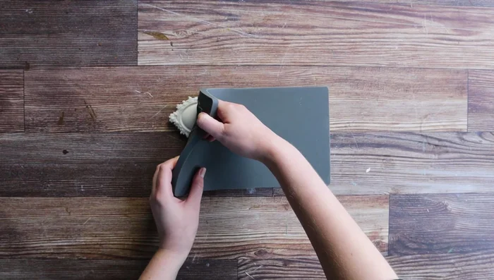 Optional: Seal the interior of the brooch before applying the transfer to improve adhesion.